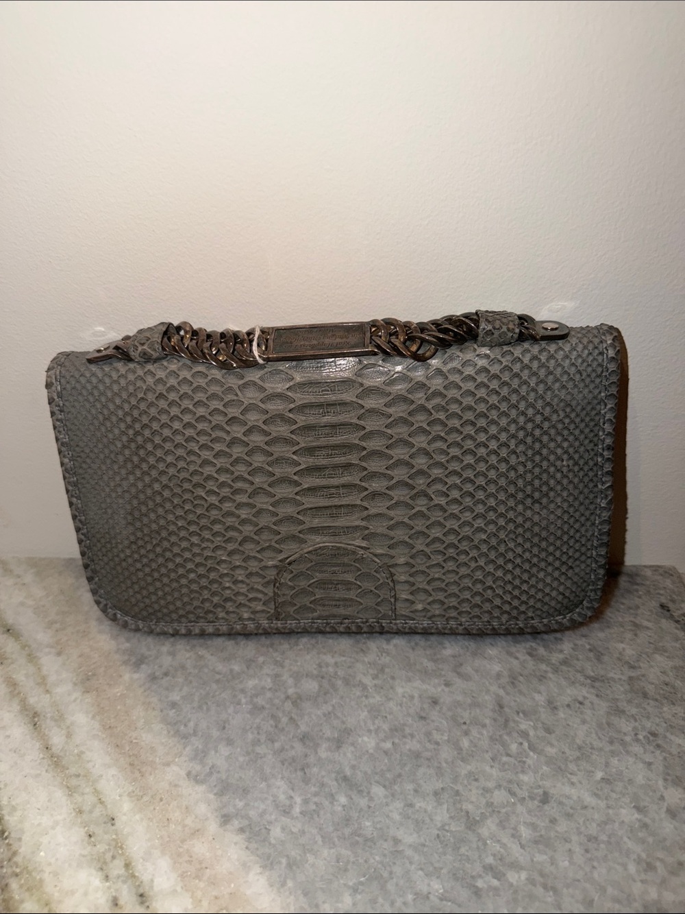 Gray Snake-Embossed Wristlet Clutch with Chain Detail